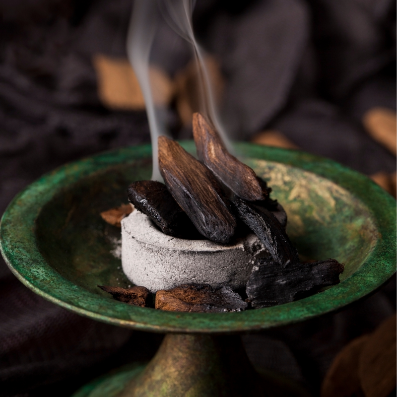 Smoke of oud on incense burner