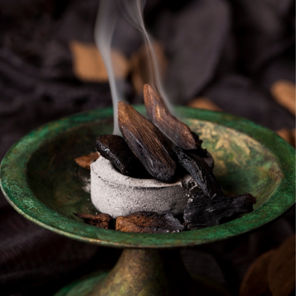 Smoke of oud on incense burner